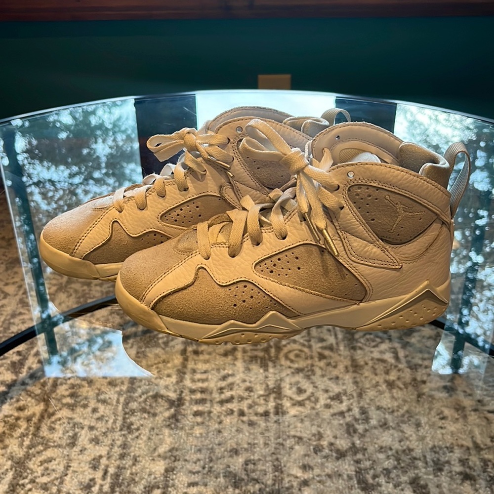 Size 4 youth Jordan 7 Pure Money like new. White and Grey.